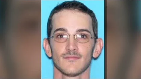 Suspect's 911 call: Back off or I'll kill her