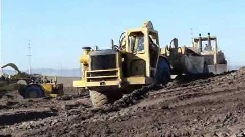 Repowered CAT D10N w /C27 pushing 651B