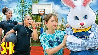 easter bunny gets dunked on by teenagers in basketball game