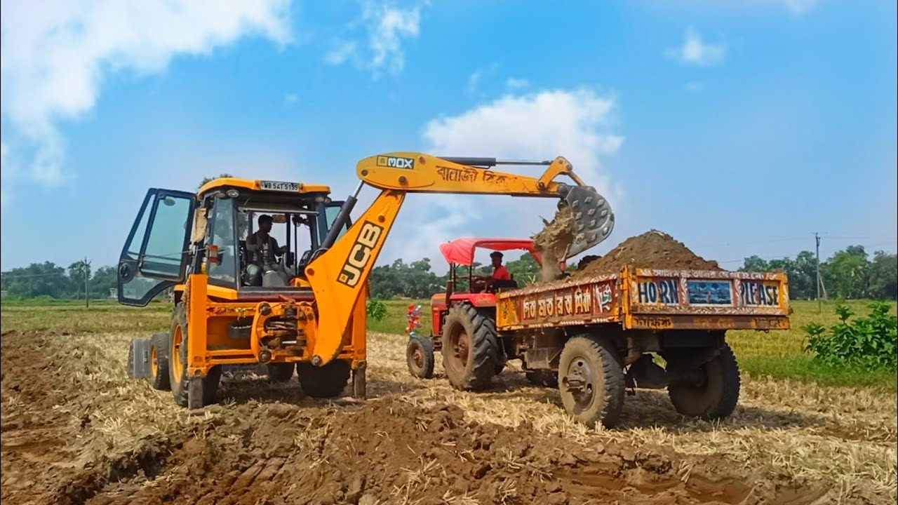 New Jcb 3dx Backhoe Loader Machine Loading Red Mud In Massey farguson ...