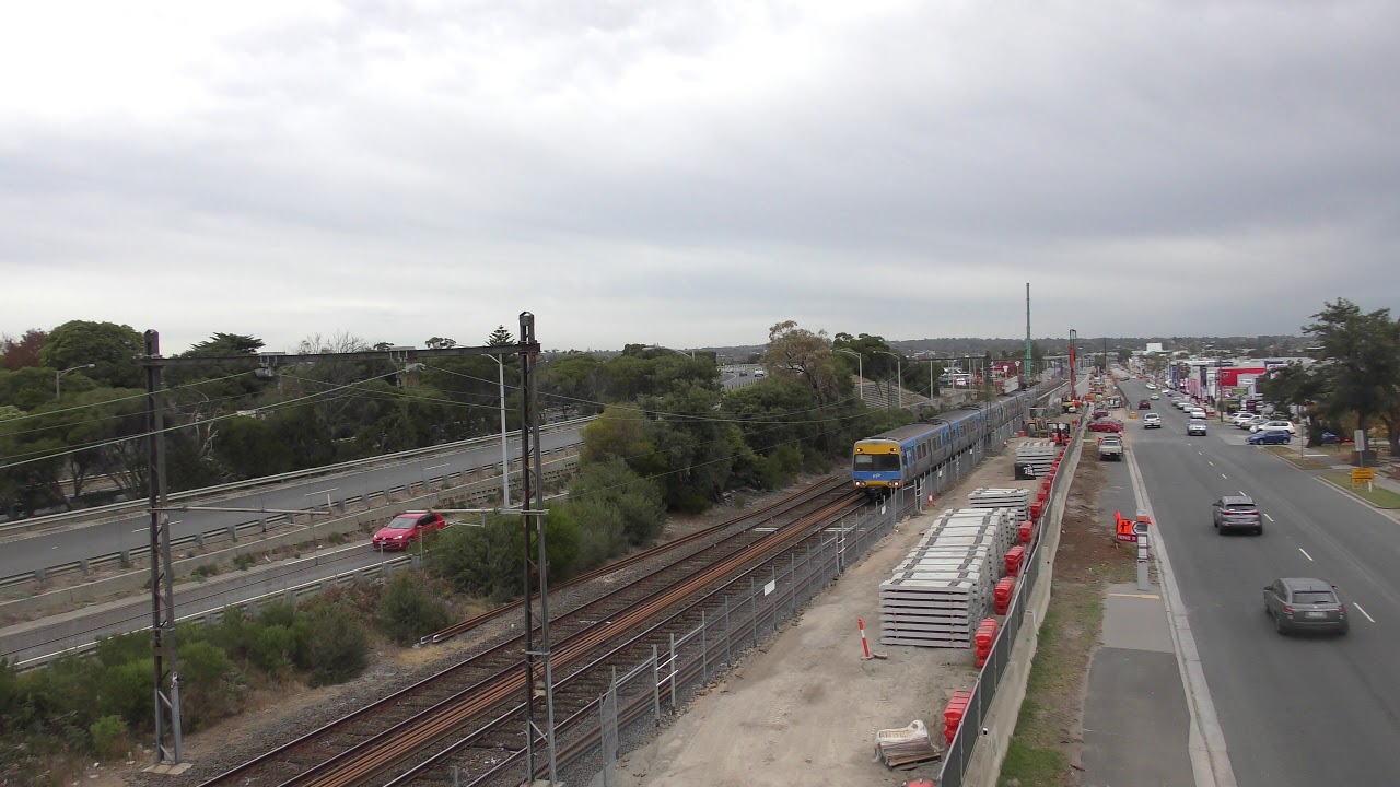 Comeng passing Overton Road / Skye Road crossing YouTube
