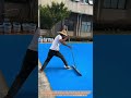 The Art of Applying Acrylic Court Surfacing with Long-Handled Squeegees