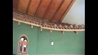 Removing inside roof tiles in Vilcabamba House