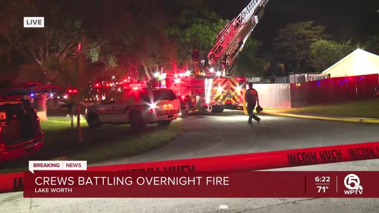 Firefighters battle blaze at abandoned home - YouTube