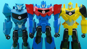 TRANSFORMERS ROBOTS IN DISGUISE OPTIMUS PRIME BUMBLEBEE STEELJAW