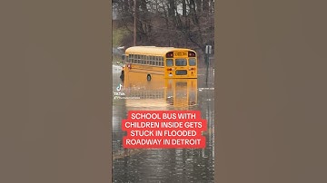 School bus with kids inside gets stuck in flooded roadway in #Detroit