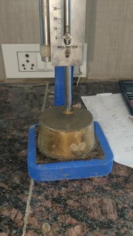Cement Test - Setting Time - Using Vicat Apparatus .