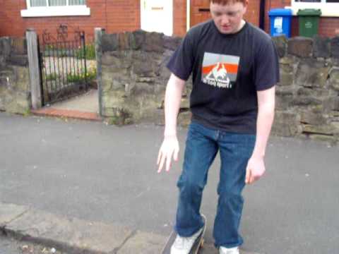 Liam Evans falls into the road