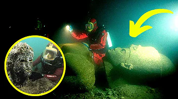 Divers Find 16 Foot Statue On The Ocean Floor, Then Realize It's Not The Only Thing Down There