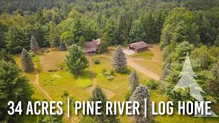 Over 1/2 Mile of Private River Frontage | 34 Acres + Log Home in Northern Michigan