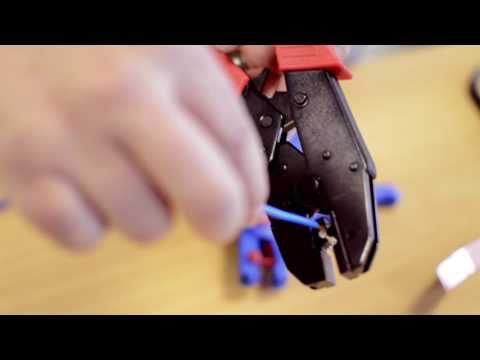 Using a crimp to connect cable to copper foil in a hearing loop