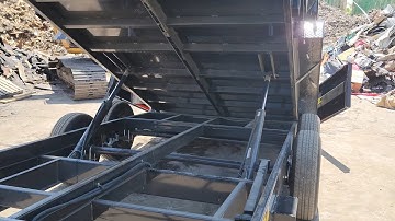 Dumping the trailer full of roofing material