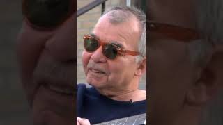 John talking about his grandfather and playing "Grandpa Was A Carpenter"