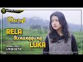 Sheryl  rela menanggung luka official music takkan kusesali walau dirimu pergi dariku