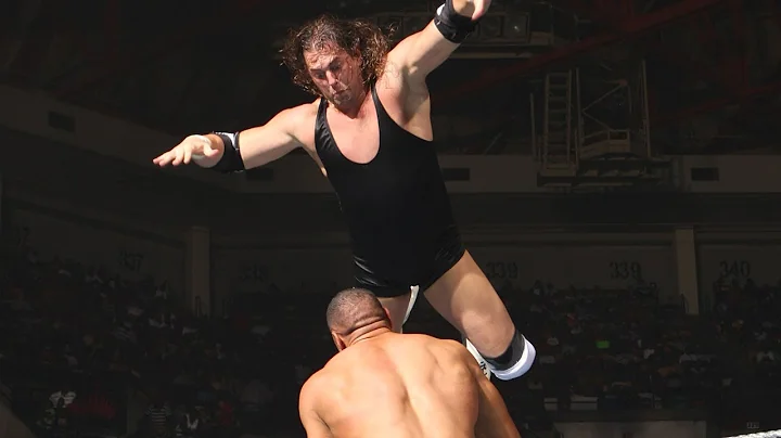 Braden Walker soars from the top rope in clash wit...