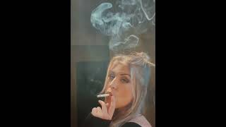 Beautiful girl smoking hard and deep