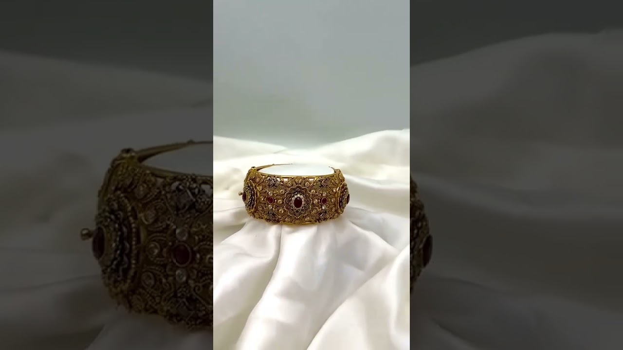 Regal. Intricate. Timeless. ✨ This handcrafted gold kara adorned with ruby accents is a masterpiece