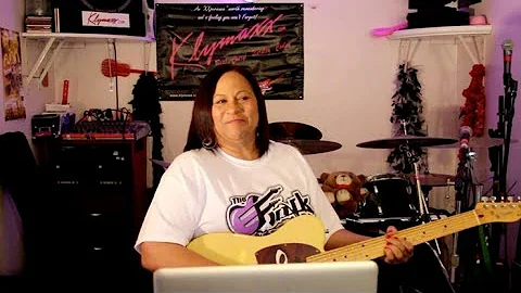 Cheryl Cooley, Lead Guitarist for the Funk group, ...