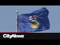 Why are Albertans having a referendum on another potential referendum?