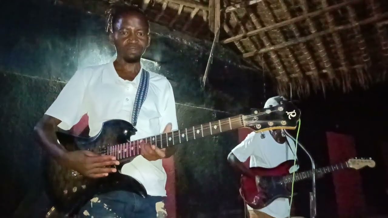 Meet Vuusya Ungu playing Bass Guitar Live at Kiunduani Green Villa Lounge
