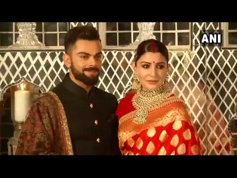 Virat Kohli & ARent a Carhka Sharma at their wedding reception in Delhi, WATCH VIDEO| वनइंडिया हिंदी