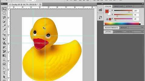 Photoshop CS5 Tutorial Displaying Drawing Guides Adobe Training Lesson 1.10