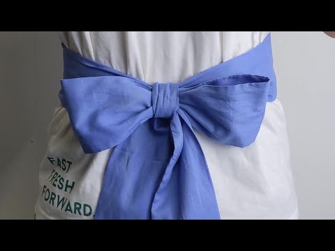 Video: Hur man bär slipsband