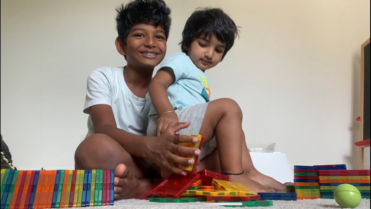 Building a rocket with magnetic tiles (while my sister destroys it)