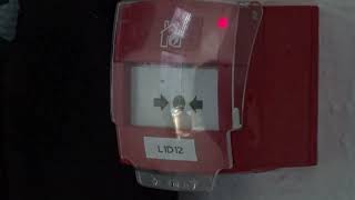 Breaking the glass in a Fire Alarm Call Point (EMS Firecell weekly test)