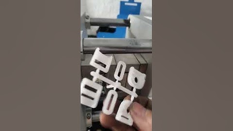 Lab desktop mini injection molding machine on operation