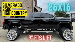 **EXTREMELY WIDE TRUCK** 26x16 on Silverado 2500 High Country 9 inch FTS lift kit, and wheel lights!