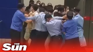 Mass Panic As Shoppers Rush From Ikea In Flash Lockdown In China shorts