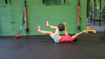 Dead Bug with Same Side Med Ball Squeeze