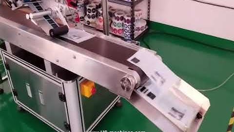 Empty bag pouch paging feeding conveying top labeling machine