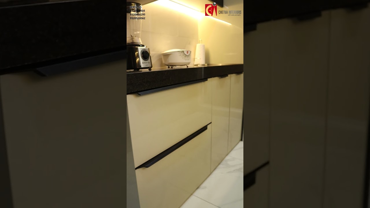 Smart & Space-Saving Kitchen Interior | Raymond Ten X by Chetna Interiors