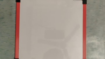 A circular disk of moment of inertia It is rotating in a horizontal plane, about its symmetry axis,