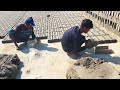 Clay mud shaped into rectangular brick in a traditional wood frame