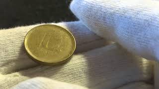 Брак на монете 10 рублей-сильный непрочекан