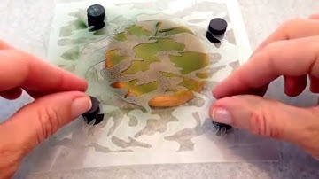 Airbrushing camouflage cookies with The Cookie Countess 3 piece stencil set.