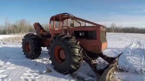 Timberjack 230 Log Skidder - Pulling Skids