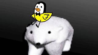 Rubber Penguin on a Polar Bear