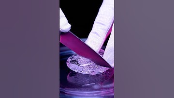 Cutting a whisper glass shard with surreal precision #ai #asmr #abstract