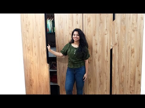 Video: Glossy Wardrobe: Hinged Corner Models With Hinged Doors And A Glossy Facade, Options In Black In The Interior Of The Bedroom And Hallway