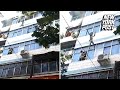 Video: Brave mom throws kids from burning building before dying