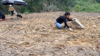 Renovating the garden - Two children helped pick up rocks