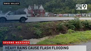Flooding leaves roads impassable, debris lingers