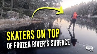 Person and a Friend Skating on the First Ice of the Season on Top of Frozen River’s Surface