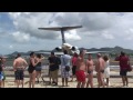 Wife recording jet blast but gets way too close in St. Maarten