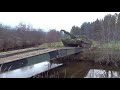 Polish T-72 crossing a river on a temporary bridge. Trident Juncture 2018