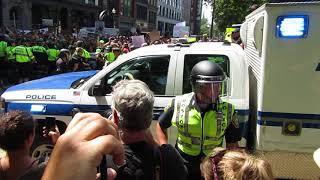 Police moving crowd and making arrests at the Free Speech protest in Boston
